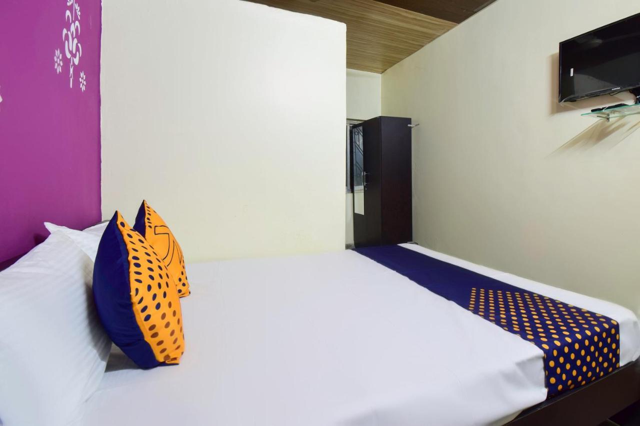 SPOT ON 66795 Hotel Abhijeet Otur Buitenkant foto